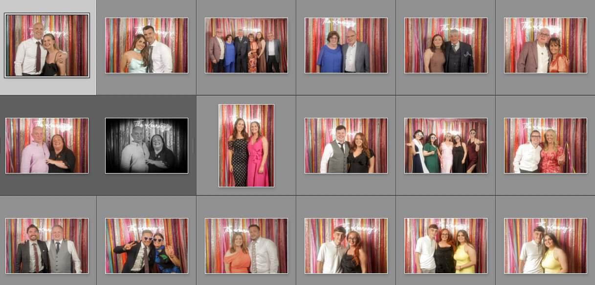 A grid of fifteen photo booth images shows various pairs and small groups of people posing in front of a pink-striped backdrop. Most subjects are smiling, some wear formal attire, and one image appears in black and white.